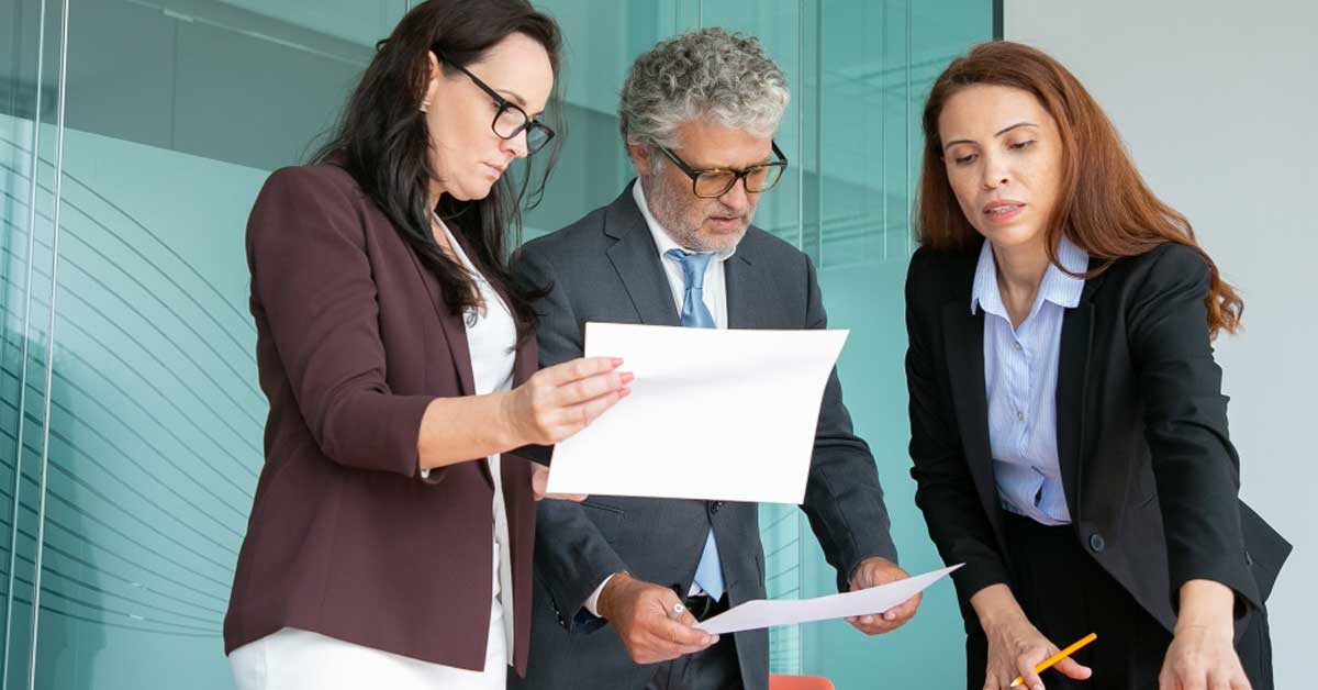 Calendar and documents representing FDA registration renewal deadlines for food, drug, and device facilities