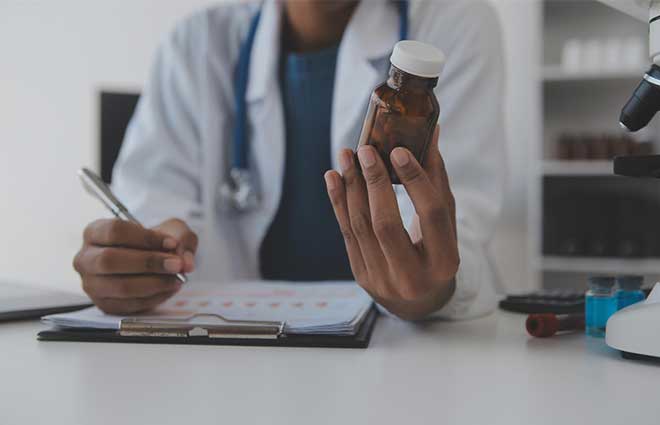 Regulatory specialist preparing a New Drug Submission package for Health Canada review