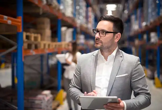 Regulatory specialist reviewing import compliance documentation for a Canada and U.S. market entry project.