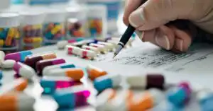 FDA OMUFA arrears list update shown on a regulatory compliance document with OTC drug facility fee schedule for FY 2026