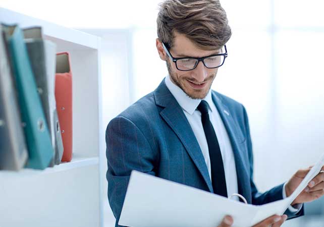 Regulatory consultant reviewing documentation in support of an FDA health claim substantiation dossier