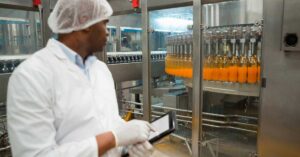 Food scientist reviewing ingredient documentation related to mandatory GRAS notification requirements