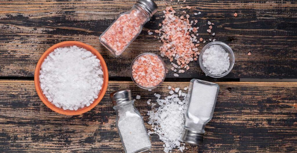 FDA final rule on salt substitutes in standardized foods illustrated with a sodium chloride shaker beside a regulatory document and food product labels