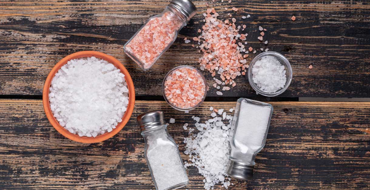 FDA final rule on salt substitutes in standardized foods illustrated with a sodium chloride shaker beside a regulatory document and food product labels