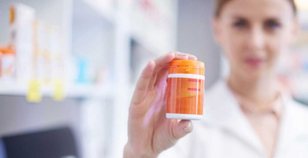 Natural health product labels on a shelf representing Health Canada monograph label updates